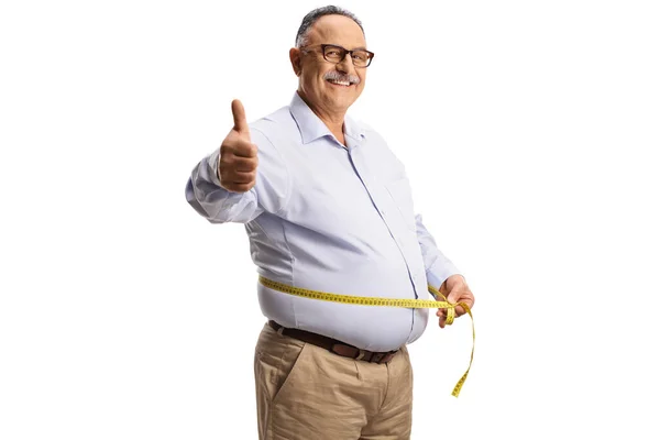 Cheerful Mature Man Measuring Waist Tape Gesturing Thumbs Isolated White — Stockfoto