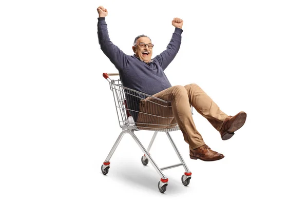Dojrzały Mężczyzna Wewnątrz Wózka Zakupy Gestykulując Szczęście Odizolowany Białym Tle — Zdjęcie stockowe