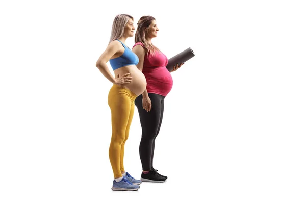 Full Length Profil Záběr Dvou Těhotných Žen Sobě Sportovní Oblečení — Stock fotografie