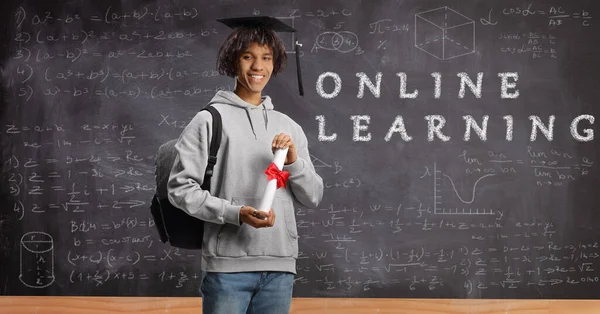 African American Male Student Holding Diploma Posing Front Blackboard Text — Stock Photo, Image