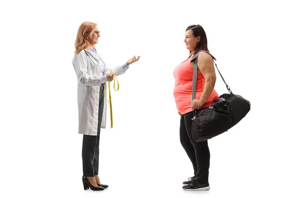 Full Length Profile Shot Doctor Talking Overweight Woman Isolated White — Stock Photo, Image