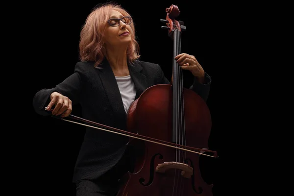 Mature Female Artist Playing Cello Isolated Black Background — Stock Photo, Image