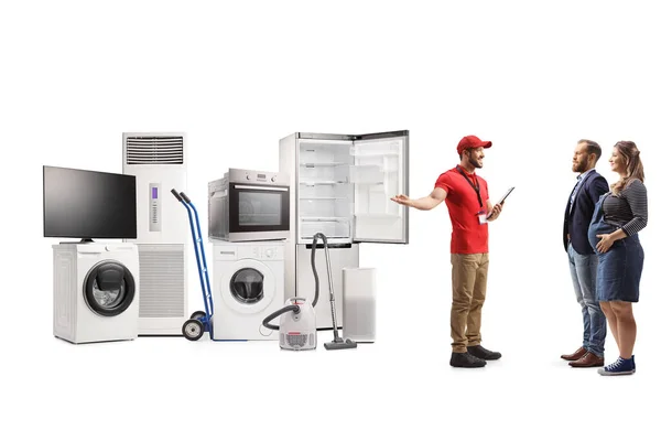 Vendedor Eletrodomésticos Mostrando Eletrodomésticos Para Homem Uma Mulher Grávida Isolados — Fotografia de Stock
