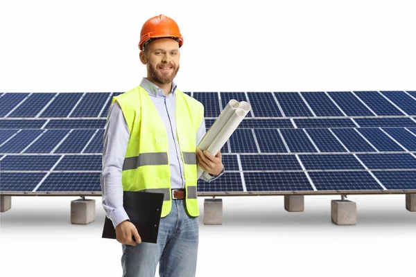 Young Male Engineer Holding Blueprints Clipboard Solar Panel Field Isolated — Stock Photo, Image