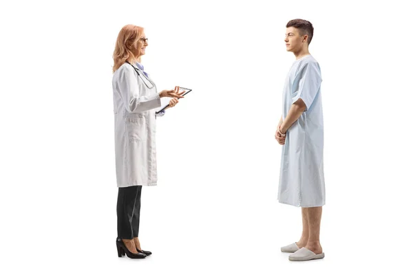 Full Length Profile Shot Doctor Talking Young Hospitalized Male Patient — Stock Photo, Image