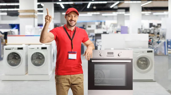 Salesman Electrical Appliances Smiling Pointing Store — Stock Photo, Image