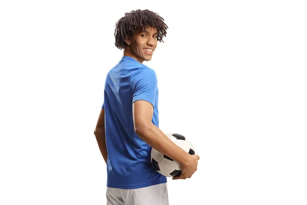 Giocatore Football Afroamericano Che Tiene Una Palla Guarda Dietro Una — Foto Stock