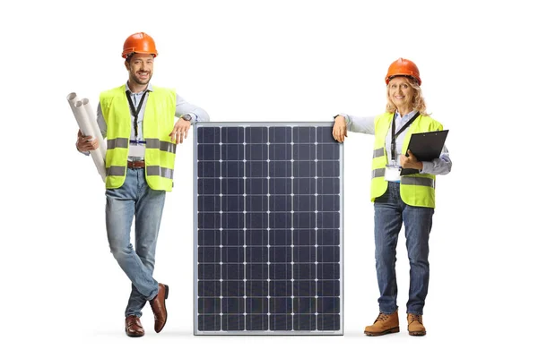 Male Female Engineers Safety Vests Leaning Solar Panel Isolated White — Stock Photo, Image