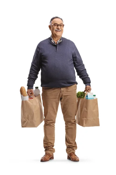 Full Length Portret Van Een Volwassen Man Dragen Boodschappentassen Geïsoleerd — Stockfoto