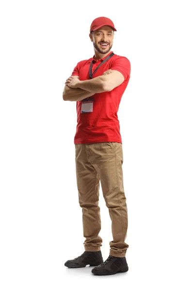 白地に赤いTシャツを着た若い男性販売員の完全長撮影 — ストック写真
