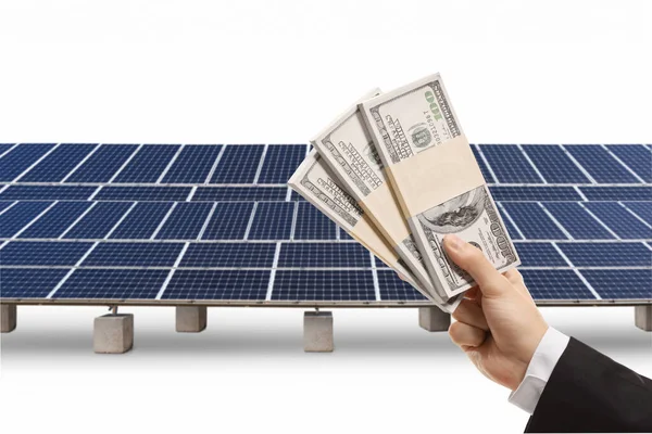 Mano Masculina Sosteniendo Dinero Una Granja Solar Aislada Sobre Fondo —  Fotos de Stock