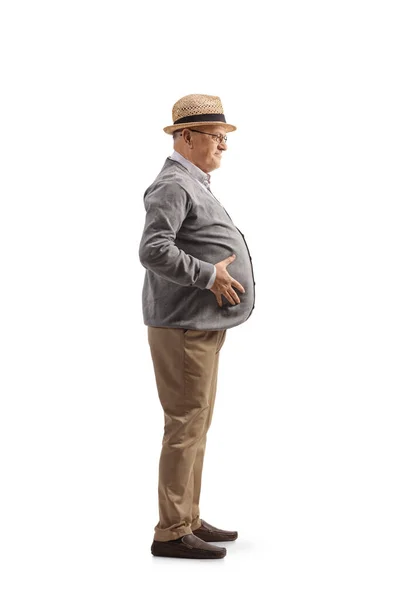 Full Length Profile Shot Senior Mężczyzna Trzyma Jego Duży Brzuch — Zdjęcie stockowe