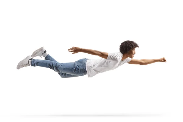 African American Guy Jeans White Shirt Flying Isolated White Background Royalty Free Stock Photos