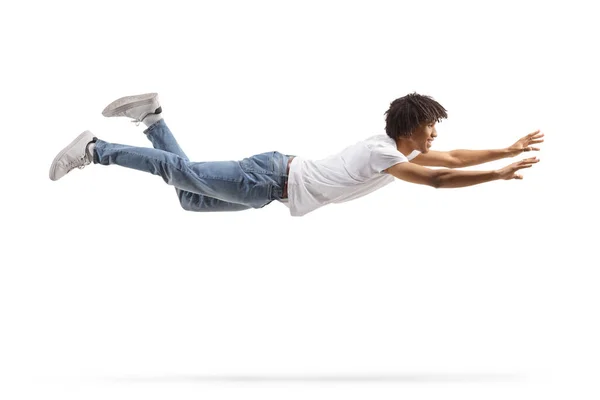 Afroamerikansk Kille Jeans Och Vit Shirt Flyger Och Försöker Fånga — Stockfoto