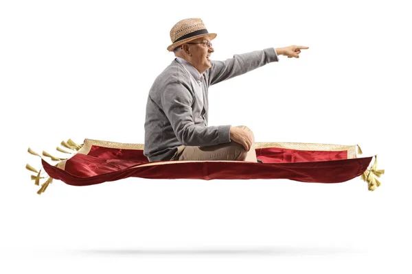 Φωτογραφία Προφίλ Ηλικιωμένου Που Πετάει Κόκκινο Βελούδινο Χαλί Και Δείχνει — Φωτογραφία Αρχείου