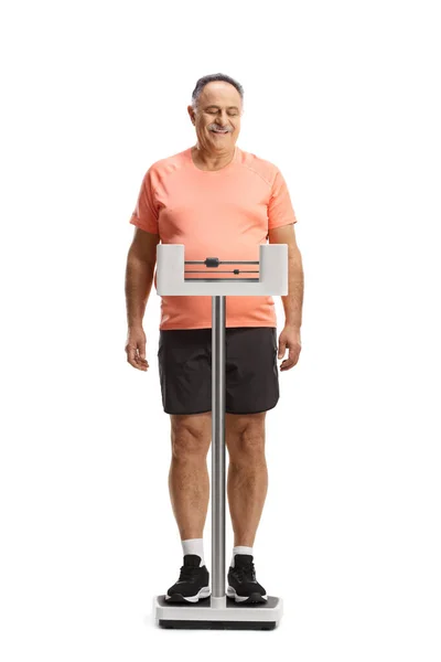Full Length Portrait Smiling Mature Man Weighing Medical Scale Isolated — Stock Photo, Image