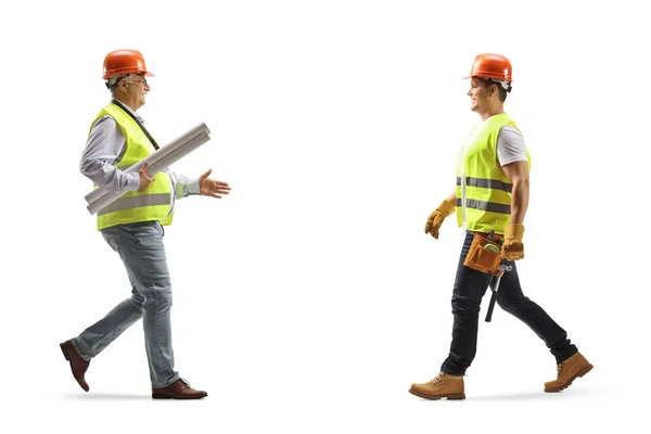 Full Length Profile Shot Engineer Carrying Blueprints Greeting Construction Worker — Stock Photo, Image