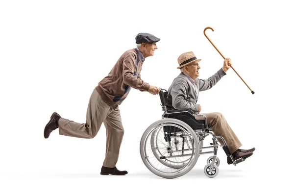 Oudere Man Duwt Een Senior Een Rolstoel Houdt Een Stok — Stockfoto