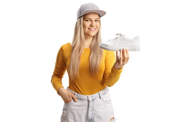 Trendig Casual Ung Kvinna Som Håller Vit Sneaker Isolerad Vit — Stockfoto