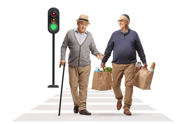 Man Carrying Grocery Bags Crossing Street While Having Conversation Senior — Stock Photo, Image
