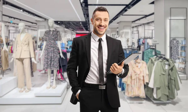 Retail Manager Holding Clipboard Document Clothing Store — Stock Photo, Image