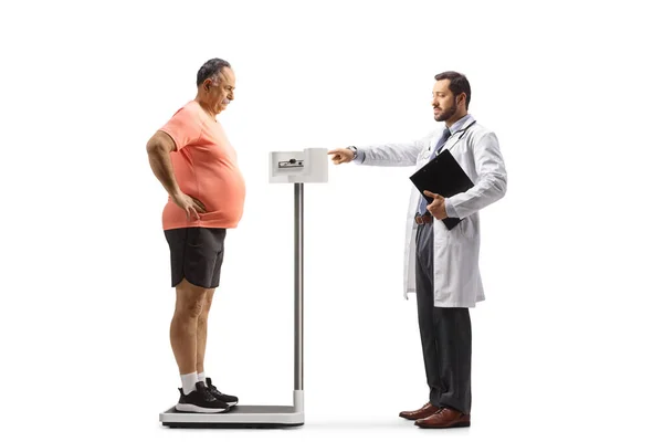 Doctor Measuring Mature Patient Sportswear Medical Weight Scale Isolated White — Stock Photo, Image