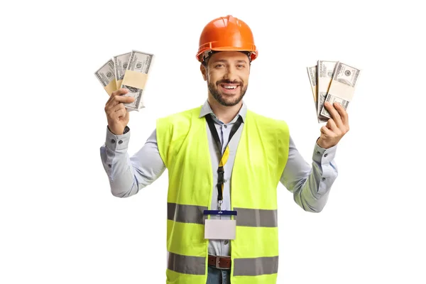 Güvenlik Yeleği Kasketli Bir Erkek Mühendis Elinde Yığınla Para Beyaz — Stok fotoğraf