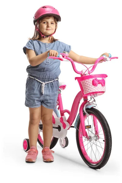 Meisje Met Een Helm Naast Een Roze Fiets Met Zijwieltjes — Stockfoto