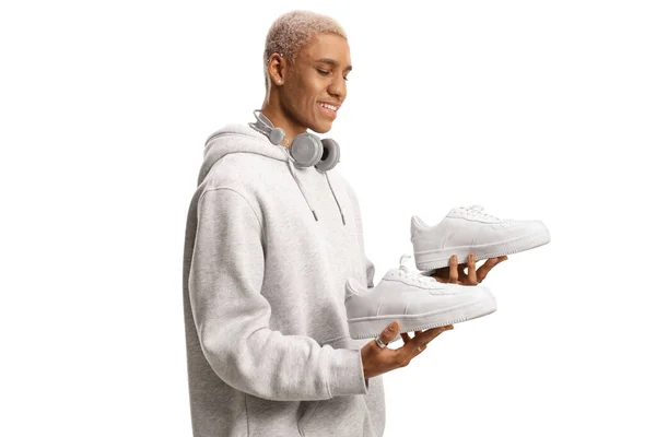 African American Guy Holding Pair New White Sneakers Isolated White — Stock Photo, Image