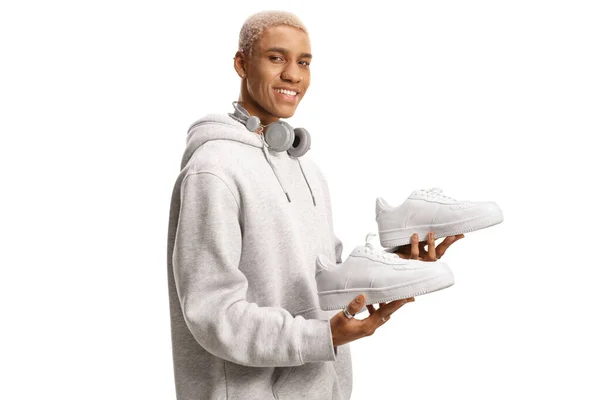 African American Young Man Holding Pair White Sneakers Isolated White — Stock Photo, Image