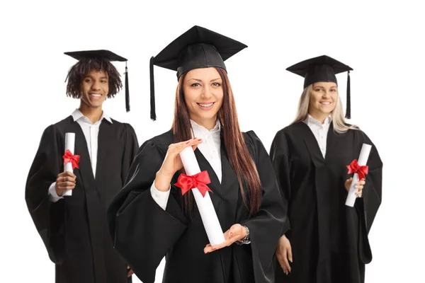 Three Graduate Students Black Gowns Holding University Diplomas Isolated White — Stock Photo, Image