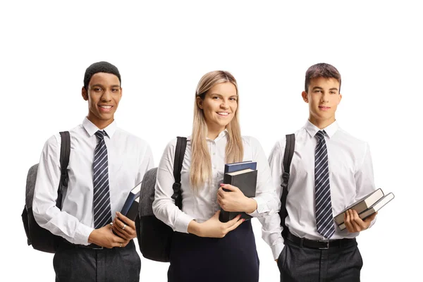 Männliche Und Weibliche Schüler Schuluniformen Mit Büchern Auf Weißem Hintergrund — Stockfoto