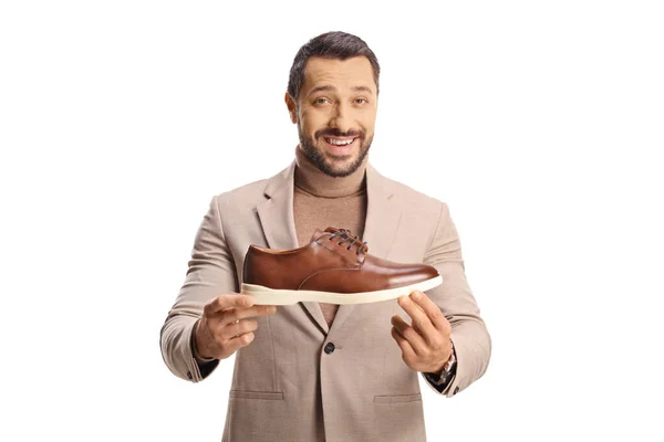 Young Man Showing Brown Leather Shoe Smiling Isolated White Background — Stock Photo, Image