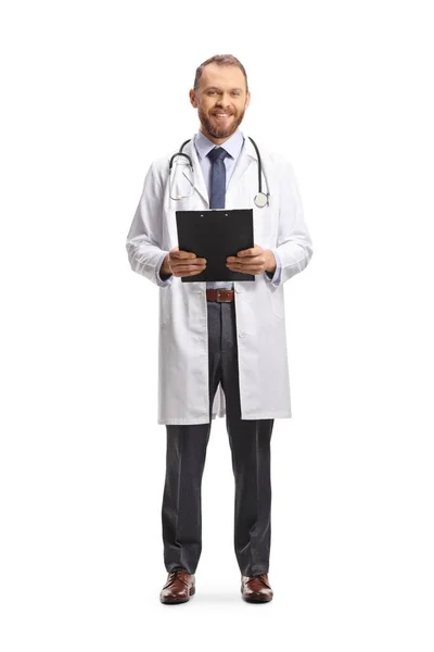 Full Length Portrait Male Physician Smiling Holding Clipboard Isolated White — Stock Photo, Image
