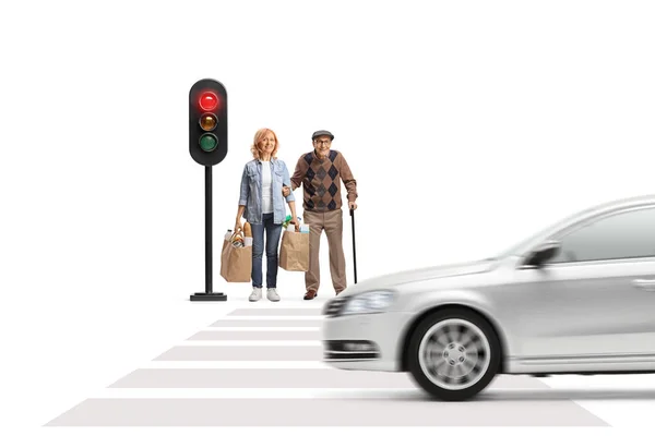 Woman Helping Elderly Man Cane Carrying Grocery Bags Traffic Lights — Stock Photo, Image