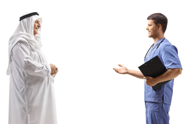 Male Doctor Blue Uniform Talking Mature Arab Man Isolated White — Stock Photo, Image