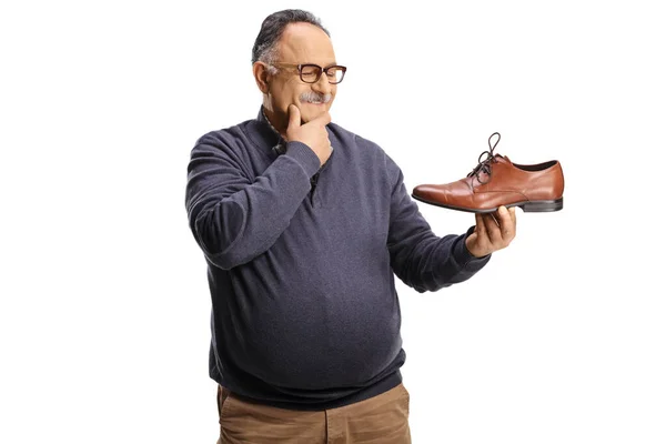 Mature Man Holding Elegant Brown Leather Shoe Thinking Isolated White — Stock Photo, Image