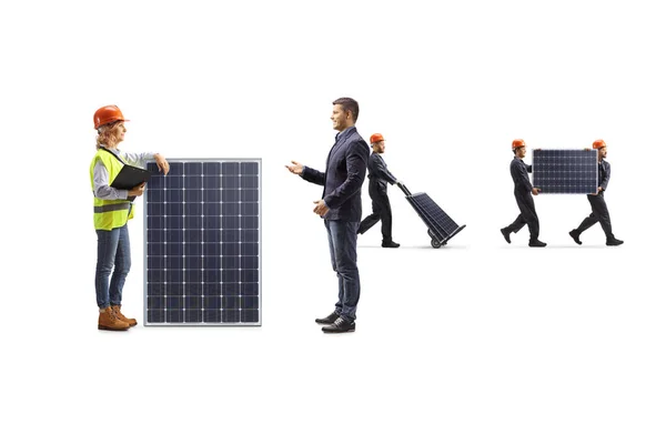 Mann Diskutiert Mit Einer Ingenieurin Über Ein Solarmodul Auf Weißem — Stockfoto