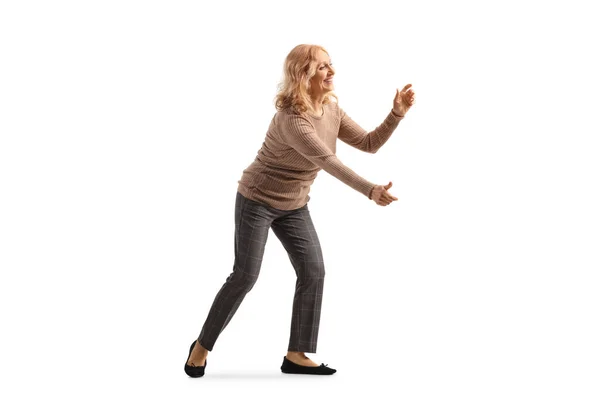 Full Length Shot Cheerful Woman Trying Catch Something Isolated White — Stock Photo, Image