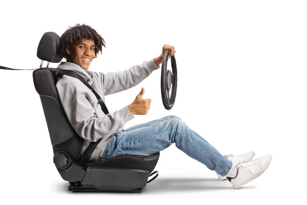 Casual African American Young Man Holding Steering Wheel Gesturing Thumbs — Stock Photo, Image