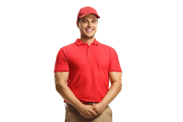 赤いTシャツの笑顔の男と白い背景に隔離された赤いキャップ — ストック写真