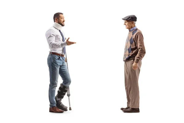 Full Length Profile Shot Injured Man Crutch Talking Elderly Man — Stock Photo, Image