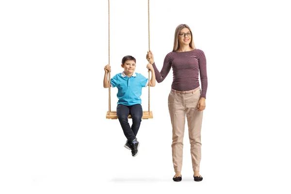 Mother Standing Next Son Swing Isolated White Background — Stock Photo, Image