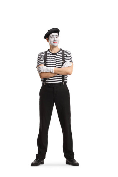 Full length portrait of a mime posing with folded arms isolated on white background