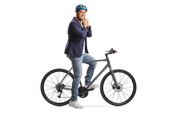 Hombre Con Una Bicicleta Que Pone Casco Aislado Sobre Fondo — Foto de Stock