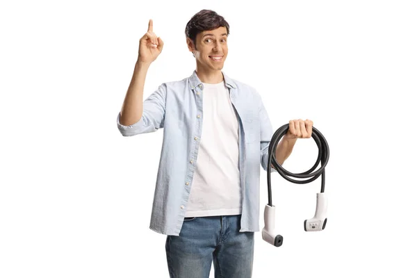 Glimlachende Man Met Een Kabel Voor Elektrische Auto Opladen Omhoog — Stockfoto