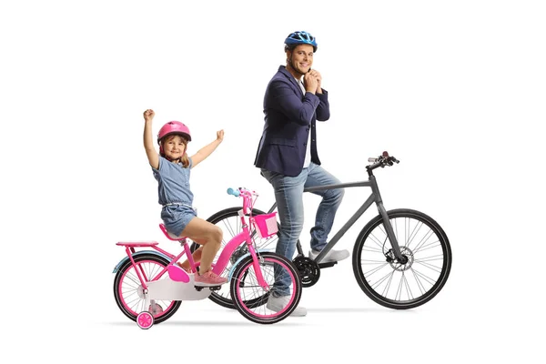 Father and daughter with bicycles putting on helmets isolated on white background
