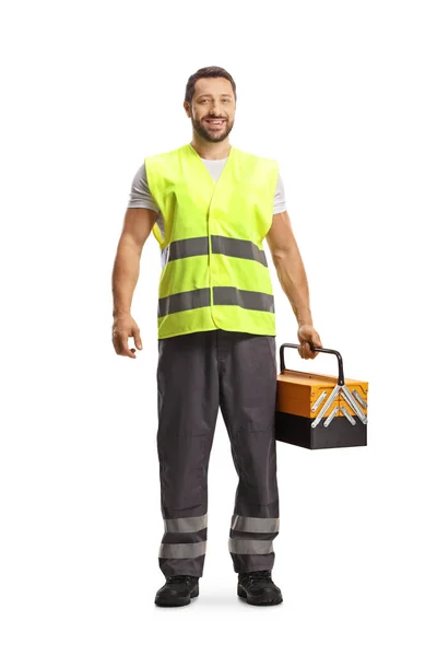 身着反光背心的道路援助工作者拿着一个以白色为背景的工具箱 — 图库照片