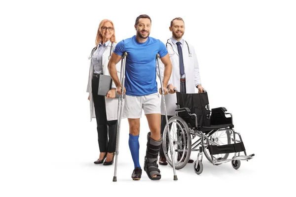 Full Length Portrait Male Athlete Crutches Walking Brace Standing Front — Stock Photo, Image