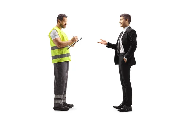Road Assistance Worker Reflective Vest Writing Document Talking Businessman Isolated — Stock Photo, Image